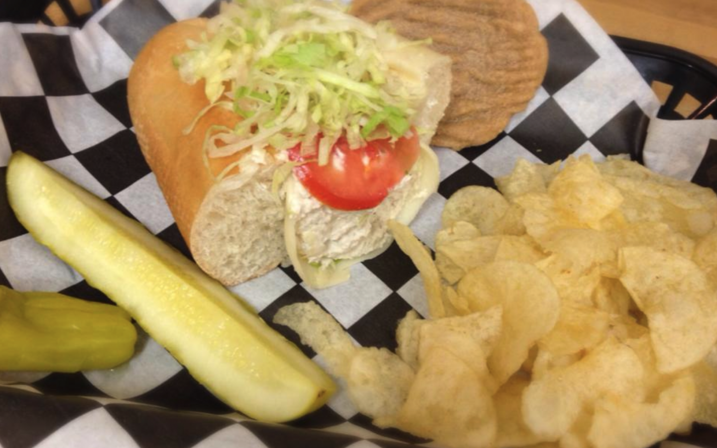 s Turkey sandwich with kosher pickle and potato chips
