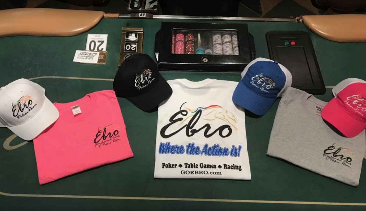 photo of t-shirts, ball caps, and poker chips