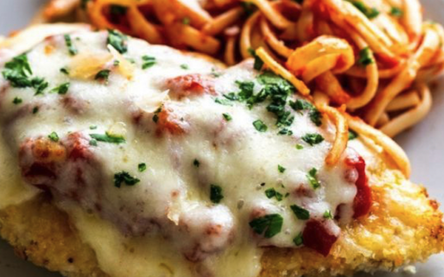 chicken Parmesan with a side of thin pasta