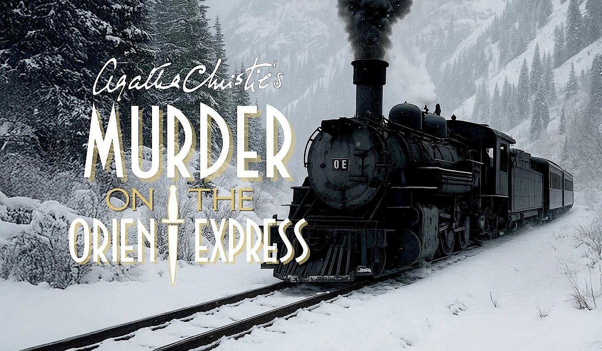 train running through snowy mountains