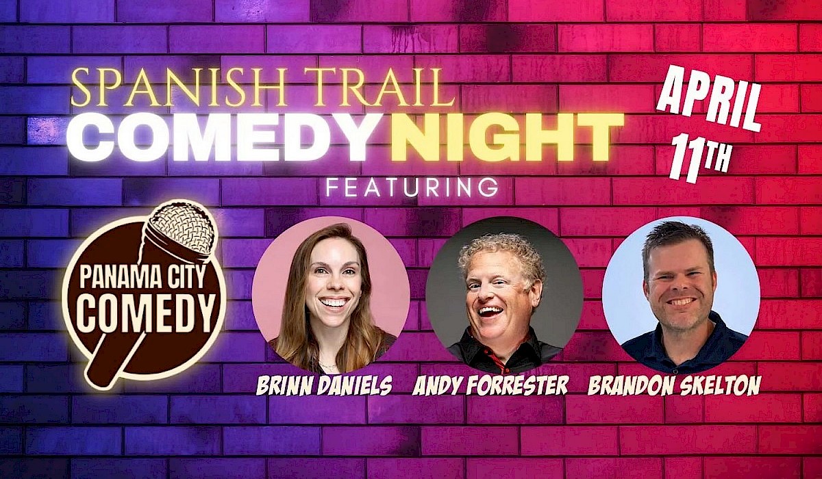 three comedians laughing in front of a stage wall